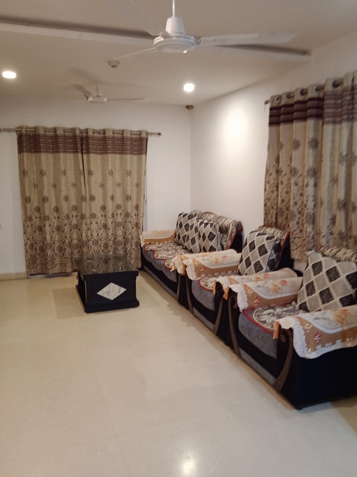 Comfortable living room at Krishna's Serene Holidays serviced apartment
